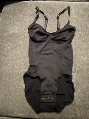 SKIMS-Black Women's One-Piece Bodysuit with Adjustable Straps